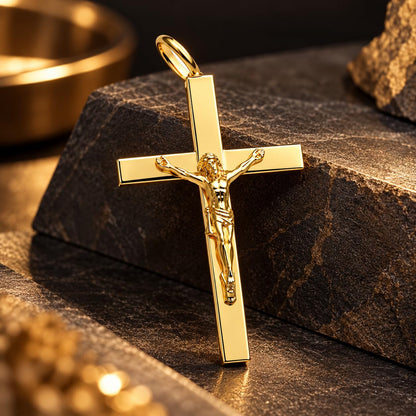 Man wearing a 10K gold Jesus cross pendant on a gold curb chain over a black t-shirt